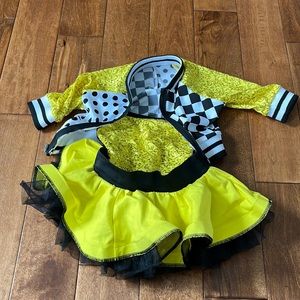 yellow leotard with tutu and jacket